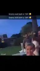 In this candid outdoor scene, a young child in a superhero-themed shirt stands near a wicker table as adults relax nearby. The atmosphere shifts abruptly when an older woman suddenly falls backward into a swimming pool, her surprise captured on camera. The moment blends everyday family life with a surprising and humorous mishap. by @rs4_6h with Original Sound by rs4_6h