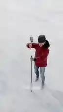 Watch as a man uses a hammer, chainsaw, and boat motor to create a massive, glowing ice disc in the snow. This impressive DIY project shows how to cut a perfect circle from a frozen lake, add a motor for slow rotation, and finish it with a campfire for a stunning visual effect. by @bilil01 with Original Sound by bilil01