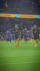 This video captures the post-match celebration of Manchester United players after a victory against Arsenal at the Emirates Stadium. The footage shows players in their black away kits walking off the pitch, applauding the fans, and sharing emotional embraces with teammates and staff. The atmosphere is electric, with thousands of supporters filling the stands, creating a memorable moment of sportsmanship and team spirit. by @manutd with Original Sound by manutd