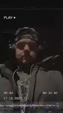 In this raw, unfiltered behind-the-scenes look from AUSTIN SOUND GROUP© youngLA, a music producer is captured in deep concentration during a late-night studio session. Wearing professional headphones and a beanie, he adjusts levels and monitors audio, showcasing the intense focus required in modern sound production. The grainy VHS-style filter and timestamp overlay add an authentic, nostalgic feel, highlighting the meticulous craft of music creation. by @theonlyyoungla with Original Sound by theonlyyoungla