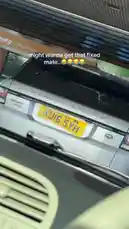 A humorous look at a Range Rover with a cracked rear windshield, showcasing a quirky UK license plate 'KU16 SYH'. The scene is set inside a car, capturing a candid moment of automotive imperfection with a playful text overlay suggesting it needs fixing. by @uk-gos with Original Sound by uk-gos