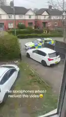 A white BMW hatchback is being towed away from a residential driveway by a police vehicle in a UK neighborhood. The scene captures the moment of the tow, with the car secured on the flatbed of a tow truck. by @uk-gos with Original Sound by uk-gos