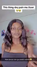 In this lighthearted clip, Ameerah showcases her comedic talents with a funny facial expression and playful gestures. She humorously comments on something causing her pain, using the Nigerian Pidgin phrase 'This thing dey pain me Aswr' (As I Swear). The scene is set in her room, creating an intimate and relatable atmosphere. by @itz.miirah with Original Sound by itz.miirah