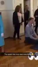 In a candid and charming scene, Queen Elizabeth II is seen observing a young child playfully crawling on a wooden floor indoors. The child navigates around a small orange cone, while the Queen, dressed in a striking blue coat and matching hat adorned with floral details, watches with a gentle smile. The moment captures a rare, lighthearted interaction between royalty and childhood innocence, showcasing a softer side of public life. by @rs4_6h with Original Sound by Contains: Cbat - Hudson Mohawke