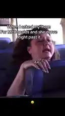 A young woman in the passenger seat of a car looks shocked and exasperated after her mother drives past a McDonald's restaurant without stopping. The mother, seen from the driver's seat, seems oblivious to her daughter's unspoken request. This relatable moment of sibling or parent-child misunderstanding captures the humor in everyday life. by @rs4_6h with Original Sound by rs4_6h