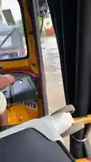 Experience a first-person view of navigating a flooded street in an auto rickshaw. The vehicle's engine roars as it pushes through deep, murky water, splashing around trees and grassy areas. This raw, on-the-ground perspective captures the challenge of urban flooding and the resilience of local transport. by @girl-spice with Original Sound by girl-spice
