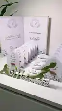 This video showcases a beautifully curated collection of personalized welcome baby gifts, perfect for baby showers or new parents. The elegant white gift boxes feature a charming rocking horse illustration, floral patterns, and custom name tags with Arabic calligraphy. Each box includes a small almond-shaped favor, adding a thoughtful touch. The overall design is minimalist and sophisticated, ideal for modern celebrations. Explore creative ways to present heartfelt gifts that combine tradition with contemporary style. by @r200an with original sound