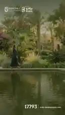 Experience the serene elegance of Ouda Developments' latest project. This promotional video showcases a tranquil garden setting with a modern pool, lush greenery, and stylish architecture, reflecting a sophisticated lifestyle. A woman in a flowing blue dress walks gracefully along the water's edge, embodying peace and luxury. The scene transitions to highlight the Ouda Developments logo, emphasizing brand identity and inviting viewers to explore more. by @ouda_dev with Original Sound by ouda_dev