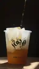 This visually captivating video showcases the art of crafting a refreshing iced coffee beverage. It begins with a close-up of rich, roasted coffee beans, transitions to freshly ground coffee, and then demonstrates the brewing process into a clear cup filled with ice. The final product is a beautifully layered iced coffee, served in a branded Wareqa cup. The sound of ice clinking and the satisfying pour enhance the sensory experience. by @wareqa.sa with Original Sound by wareqa.sa