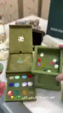 In this tutorial, we show you how to assemble a beautiful customizable ring using a set of colorful gemstone discs. A hand picks out individual stones from a green velvet box and carefully places them into a gold-colored ring setting, demonstrating a simple DIY jewelry-making process. by @moneeragh with Original Sound by moneeragh