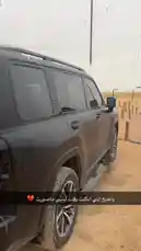 Experience the rugged beauty of the desert landscape through the lens of a modern SUV. This captivating scene captures a moment of stillness in the vast sands, showcasing the vehicle's design against the backdrop of a serene, open environment. by @by.sul with by.sul by Original Sound