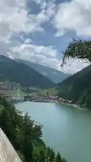 This captivating travel vlog takes you on a scenic journey through picturesque mountain villages in Turkey. From panoramic views of lakes nestled in lush valleys to charming riverside towns with traditional architecture, the video showcases the region's natural beauty. You'll see locals enjoying their daily lives, including a woman preparing a traditional flatbread at a street food stall, offering a glimpse into authentic Turkish culture. This immersive experience highlights the perfect blend of stunning landscapes and local traditions. by @sahab-alalam with sahab-alalam by Contains: Ihlamurlar Altında - İntizar