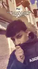 This POV clip captures the relatable moment of being late for a date while dealing with extreme heat. The creator, wearing a black quilted jacket and a scarf pulled up over their mouth, looks stressed and flustered. Arabic text overlays add context, setting the scene of rushing to meet someone. It's a short, authentic slice-of-life moment about the pressures of modern dating. by @sofaa_66 with sofaa_66 by Original Sound