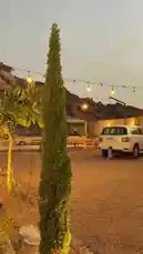 Experience the peaceful beauty of Eid mornings in a stunning desert setting. This vlog captures serene moments of family gatherings under traditional tents, enjoying delicious food together. It showcases the warmth of cultural traditions, the tranquility of nature with blooming flowers and majestic mountains, and the simple joy of community during the holy month. by @karim.alsaleh with karim.alsaleh by Original Sound