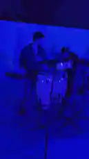 Experience the energy of a live music event through the eyes of Sif DJ. This immersive clip captures the atmosphere of a nighttime party under vibrant blue lighting, featuring a percussionist, scenic views of the venue, and the excitement of the crowd. by @djsefo with Original Sound by djsefo
