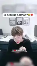 In this intense moment, creator Artem reacts with visible distress to something off-camera. He covers his face, wipes his eyes, and leans forward, seemingly overwhelmed. The text overlay 'Er det ikke normalt?' (Isn't it normal?) adds to the suspense, making viewers curious about the cause of his emotional state. by @artems-snap with Original Sound by artems-snap