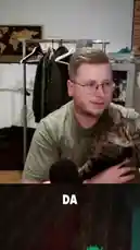 In this candid moment from itsluckymike's live stream, the creator is interrupted by his cat while discussing the duration of the broadcast. The scene captures the relatable chaos of streaming life, where pets often steal the spotlight. by @itsluckymike with Original Sound by itsluckymike