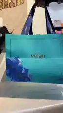 A close-up look at unboxing a luxurious Vélan chocolate gift set. The video showcases elegant packaging, a gold-wrapped chocolate bar, and a detailed taste test of a rich, nut-filled praline, highlighting the premium quality and indulgent experience. by @ch11.30 with Original Sound by ch11.30