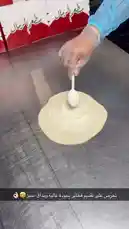 Watch a professional chef demonstrate the step-by-step process of crafting two popular dishes: a savory cheese-filled flatbread and a fresh vegetable pizza. From preparing the dough and adding fillings to baking them in a traditional brick oven, this video provides a clear, hands-on guide perfect for anyone looking to learn new cooking techniques. by @sandshawarma with Original Sound by sandshawarma