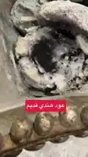 This close-up footage captures the thrilling moment of uncovering a small, shiny gold nugget nestled within a bed of ash and debris. The camera focuses on the discovery process, highlighting the contrast between the dark, sooty surroundings and the gleaming treasure, creating a captivating visual narrative of finding hidden value. by @nawader.aloud44 with nawader.aloud44 by Original Sound