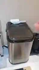 This concise tutorial demonstrates the simple process of using a modern countertop ice maker. A hand opens the unit, scoops out freshly made ice cubes, and transfers them into a glass pitcher, showcasing a convenient solution for chilling drinks at home. by @alysf90 with Original Sound by alysf90