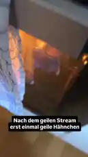 A close-up view from inside an oven shows chicken wings being cooked to perfection under a glowing heat source. A text overlay in German reads 'Nach dem geilen Stream erst einmal geile Hähnchen' ('After the awesome stream, first some awesome chicken wings'). A voiceover confirms this, saying, 'So Freunde, nach dem Hammerstream gibt's jetzt auch schon mal was richtig Geiles zum Essen. Schöne Hähnchen.' ('So friends, after the epic stream, let's have something really cool to eat. Nice chicken wings.'). by @itsluckymike with Original Sound by itsluckymike