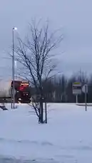 Witness a unique winter journey as Zagvik captures a striking pink semi-truck hauling a white tank trailer through a snow-covered landscape. The scene shifts to a silver SUV skillfully navigating a deep snowbank, showcasing real-world driving in challenging conditions. This captivating footage highlights the beauty and challenges of snowy roads. by @zagvik with original sound