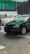 This behind-the-scenes look captures a black Chevrolet Impala being washed inside a modern car wash facility. Workers can be seen attending to the vehicle as it moves through the cleaning process, showcasing the equipment and procedures used in a professional car wash. by @kfl1 with Original Sound by kfl1