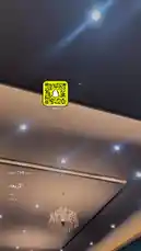 This video presents a professional showcase from منصة TASI الرقمية, focusing on elegant interior lighting design. It features a sophisticated ceiling with recessed spotlights creating dramatic light beams and a luxurious crystal chandelier, highlighting modern architectural details. by @s3432x with Original Sound by s3432x