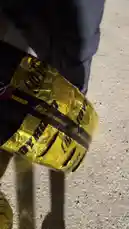 This short clip shows a person, identified as M, handling new tires wrapped in protective gold foil. The camera focuses on the tires and their packaging before panning up to reveal a purple car in the background, suggesting a tire installation or replacement scenario. by @mo_kbs8 with Original Sound by mo_kbs8