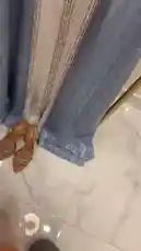 This stylish look features a light blue abaya with intricate silver threadwork and teardrop-shaped embellishments, paired with elegant tan open-toe heels. A perfect example of modern traditional fashion. by @needle_t with original sound