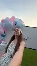 A couple prepares and executes a surprise gender reveal party for their friends. They secretly plan the event, setting up a 'Boy or Girl?' backdrop with pink and blue balloons. As guests arrive, the tension builds until the moment of truth is revealed with a burst of pink smoke, confirming the arrival of a baby girl. The couple shares emotional reactions, celebrating with loved ones and their young son. by @imsemdiary with Original Sound by imsemdiary