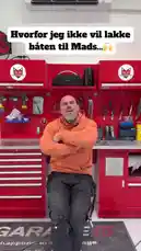 A behind-the-scenes look at Viking Custom Craft's professional workshop. The host, wearing a branded hoodie, sits in front of a meticulously organized red tool wall, showcasing custom storage solutions and a clean, functional garage space. by @vikingcustom with Original Sound by vikingcustom
