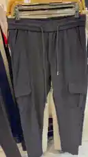 Get a close-up look at a curated selection of stylish lounge pants perfect for casual wear. This video showcases various colors, brands like Adidas and CLASSICSPORTS, and comfortable features such as drawstrings and cargo pockets, all displayed on hangers in a retail setting. by @code.a3 with original sound