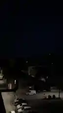 This short, atmospheric clip captures a quiet city street at night from an elevated viewpoint. As the camera remains still, a series of powerful Arabic motivational quotes appear on screen, each accompanied by its English translation. The text includes messages like 'He arranges the most beautiful destinies for his owner,' 'If your intention is good, do not be afraid,' and 'Good intentions win.' The overall mood is reflective and encouraging, blending the peaceful urban environment with a message of hope and perseverance. by @tr3i5 with tr3i5 by Original Sound