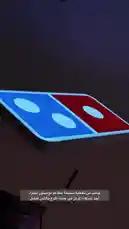 This video takes you on a tour of a modern Domino's Pizza store, showcasing its history through awards and memorabilia, and then dives into the hands-on process of making a pizza from scratch. You'll see the preparation of dough, the application of toppings like raisins, and the final product being cooked, all captured with professional filming equipment. by @ncpd.sa with Original Sound by ncpd.sa