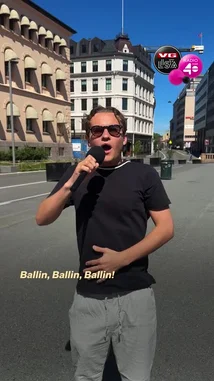 This promotional video announces the upcoming VG-lista Topp 40 festival in Oslo. It features a host on Rådhusplassen, showcasing the event's energetic atmosphere with clips of performers like Ballingega and Baagee. The video highlights the festival date, June 13th, and teases a lineup including artists such as DJ Khaled, Badguy, and Coldplay. by @vglistatopp40 with Original Sound by vglistatopp40