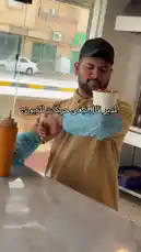 Watch as a chef from الرمــــــــال-restaurant demonstrates the final step in preparing their delicious lamb kebab bowls. He pours a rich, savory sauce over the hot meat and rice, creating a mouth-watering dish. This simple yet satisfying recipe is perfect for anyone looking to make a quick and flavorful meal. by @sandshawarma with Original Sound by sandshawarma