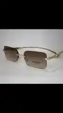 Discover a curated selection of rimless sunglasses showcasing diverse styles and materials. This collection features elegant gold-toned frames with gradient lenses, sleek black designs with textured arms, classic brown acetate frames, and modern silver-toned models with blue-tinted photochromic lenses. Each pair highlights contemporary eyewear trends, perfect for fashion-forward individuals seeking unique and sophisticated accessories. by @daioptical with original sound