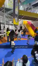 Watch children and adults dancing together in a vibrant indoor playground setting. This energetic scene captures a fun-filled event hosted by جوكو للترفيه, where kids enjoy music and movement under colorful slides and play structures. by @gioco_23 with Original Sound by gioco_23