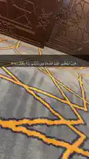 A close-up exploration of a stylish rug with bold yellow geometric patterns on a gray background. The camera glides smoothly across the textured surface, highlighting its intricate design and plush material. In the background, dark wooden furniture with ornate carvings adds depth and sophistication to the scene, suggesting a modern yet classic interior space. This serene and artistic visual focuses on texture, color contrast, and design elements, ideal for those interested in home decor, pattern inspiration, or minimalist aesthetics. by @tr3i5 with tr3i5 by Original Sound