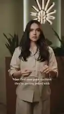 A woman in a beige suit holds up a small syringe, looking skeptical. The text on screen reads, 'What first time patients think they're getting poked with.' She then pulls back the plunger of the syringe. The text changes to 'What they're actually getting.' The video ends with the Rivive logo and the text 'essence of beauty Lumière Center, Hittin District.' by @rivive.sa with Original Sound by rivive.sa