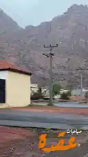 This captivating video captures a traditional Saudi Arabian social gathering inside a beautifully decorated tent. A group of men enjoy a lavish spread of food laid out on a patterned rug, sharing a meal together in a relaxed, communal setting. The scene transitions to a breathtaking view of raindrops on a windowpane, offering a serene contrast to the lively interior. The entire experience evokes a sense of cultural hospitality and the beauty of mountainous landscapes. by @karim.alsaleh with karim.alsaleh by Original Sound