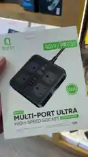A close-up product showcase of the Qufex Multi-Port Ultra High-Speed Socket power strip. The video highlights its design, ports, and specifications, including four UK-style electrical outlets, four USB-A ports, two USB-C PD ports, and a 3-meter cable. A voiceover in Arabic describes the product's features, such as its 40W total USB charging capacity, 20W PD charging, and 3000W overall load capacity. by @power.ch01 with Original Sound by power.ch01