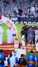 Witness the triumphant moment as the Qatar Stars League champions are crowned. Players, staff, and fans gather on a podium under a 'CHAMPIONS' arch, celebrating with confetti cannons and a trophy lift. This official QSL event captures the pure joy and excitement of winning the league. by @qsl with Original Sound by qsl