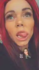 A close-up shot captures Zagvik with striking red hair and dramatic makeup. She playfully makes various facial expressions, including smiling and looking around, creating an engaging and personal moment. by @zagvik with zagvik by Original Sound