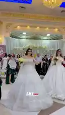 Witness a stunning bridal fashion showcase featuring models in exquisite wedding gowns walking down a grand aisle. This elegant event, captured by ART VIDEO, highlights the beauty and craftsmanship of bridal wear in a luxurious setting. by @artvideo.me with artvideo.me by Original Sound