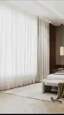 Discover contemporary bedroom aesthetics with this stylish space from 151 Constructions & General Ma. The tour showcases a serene color palette, elegant wood accents, and functional design elements like a built-in TV unit and spacious walk-in closet. This modern bedroom design is perfect for those seeking inspiration for creating a calm and sophisticated personal retreat. by @construct151 with construct151 by Original Sound