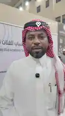 A man in traditional Saudi attire speaks directly to the camera at an event for the Al-Nassr Club Academy Tour. He discusses the academy's success, its expansion across Riyadh with eight branches, and its role in nurturing over 2,500 young players. He expresses gratitude to the Al-Nassr Club leadership for their trust and highlights a recent successful youth tournament, emphasizing player development and teamwork. The speaker also acknowledges support from the Player Association, noting that more than 30 players have represented the club, all developed through the academy's talent pipeline. by @playerassoc with Original Sound by playerassoc