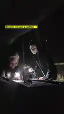 In a dark outdoor setting, two women work together to diagnose and repair a car engine under the hood. They use handheld flashlights to illuminate the engine bay, leaning in closely to inspect components and collaborate on the task. Their focused expressions and teamwork suggest they are troubleshooting a mechanical issue, possibly during a roadside breakdown. The scene captures a moment of problem-solving and cooperation in challenging conditions. by @zagvik with zagvik by Original Sound